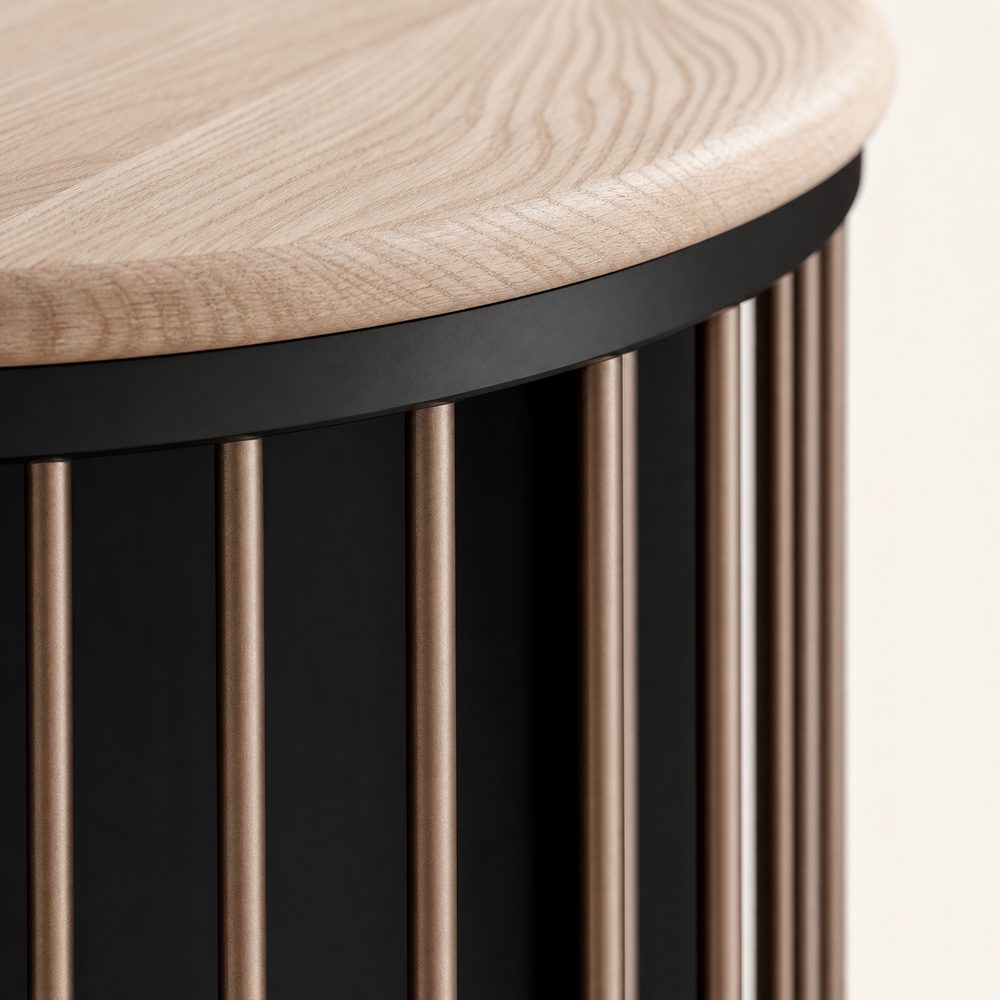Macro view of the Koja oak top, matte black rail, and bronze rods meeting at the curved corner
